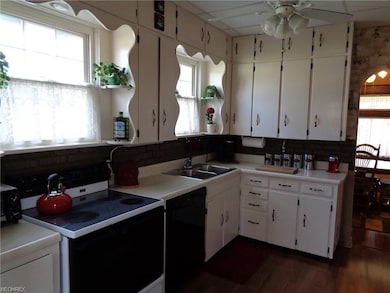 Plenty of cabinets in this charming kitchen.