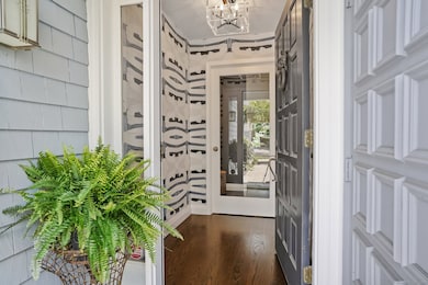 This condo has been completely updated as evidenced by this entry way with double closets.