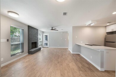 Unfurnished living room featuring light wood-styl