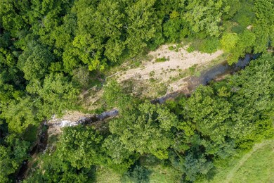 Creek and landing at base of property