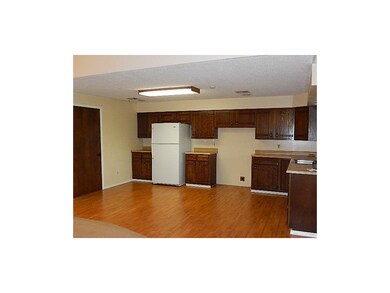 Open kitchen. Door on the left goes to the laundry