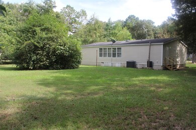 571 County Road 3796, Cleveland, TX 77328 - photo 2