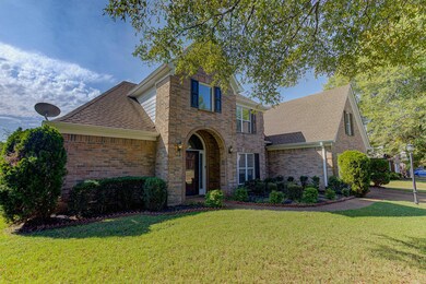 View of front of property featuring a front yard