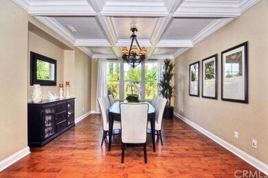 Generously sized dining room with coffered ceiling