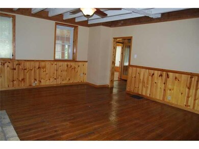 Exterior Front. LIVING ROOM, NOTICE CEILING BEAMS