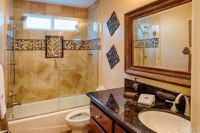 Downstairs bath remodeled with new vanity, granite