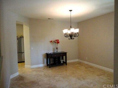 Formal Dining Room with Travertine Flooring
