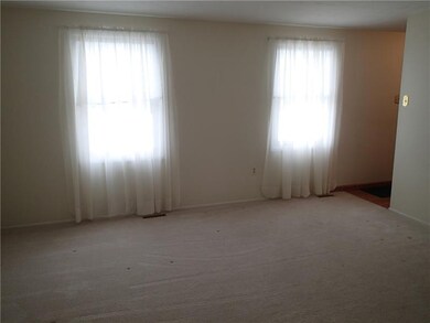 Another view of the living room with two windows!