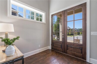 Entryway with french doors, dark hardwood / wood-s