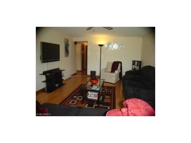 Second view of living room into hallway.