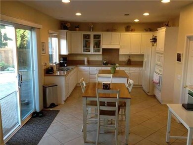 Beautiful Kitchen, tile flooring, New cabinets, Walk in Pantry and granite counter tops!