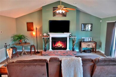 Vaulted ceiling, ceiling fan and spot lighting mak