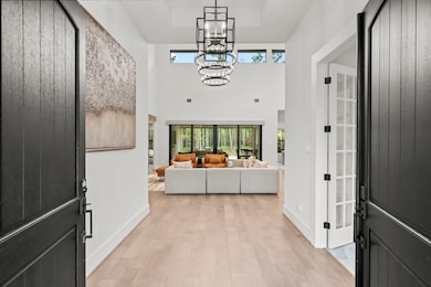 The double front doors welcome you into the Foyer
