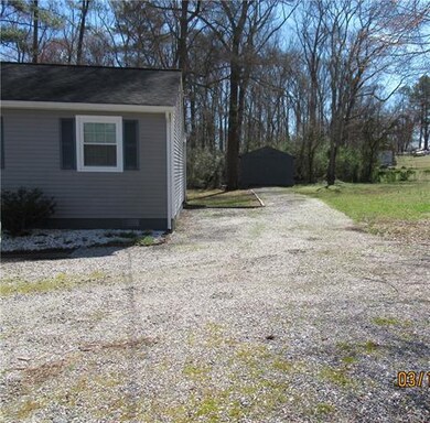 Double width parking plus more parking on side of house