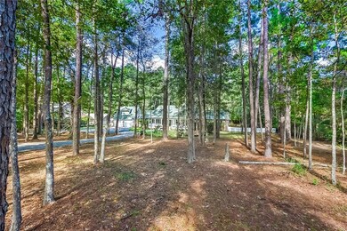 Circular driveway leads to home over 200 ft from r