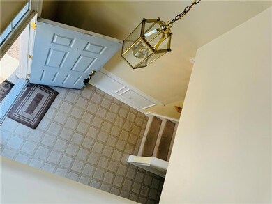 view of foyer from the upper living room
