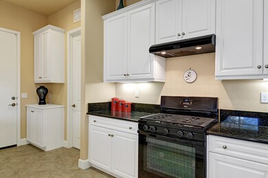 KITCHEN TO GARAGE AND UTILITY ROOM MLS