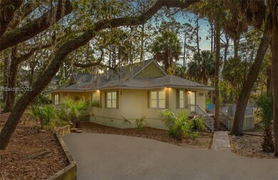 Front view of home with large & spacious driveway