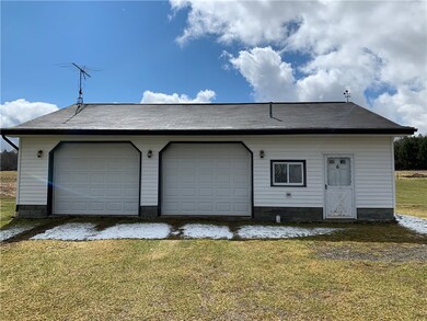 This garage has heat with a half bath.