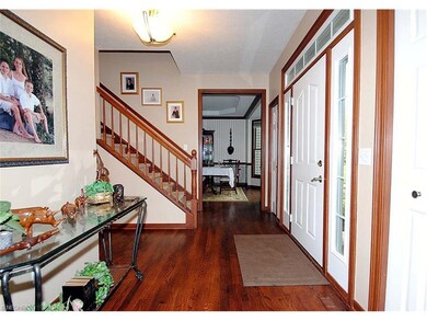 Front hall with gorgeous hard wood floors.