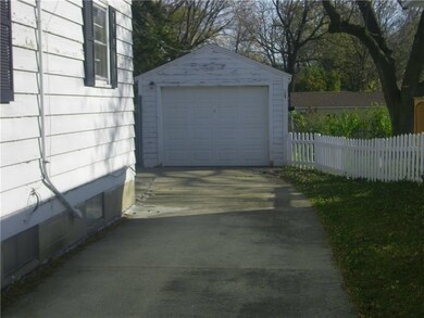 The tandem garage is deep enough for two cars.