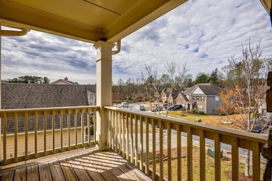 Wooden terrace featuring a residential view