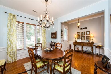 Lovely entry way and dining room. Notice the upgra