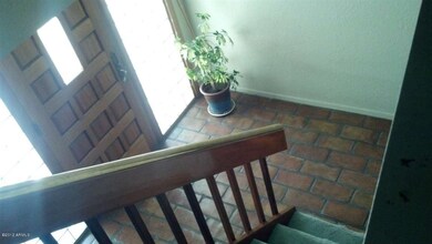 Looking down the stairwell towards entry