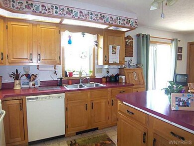 Kitchen. ANOTHER VIEW OF THE KITCHEN.