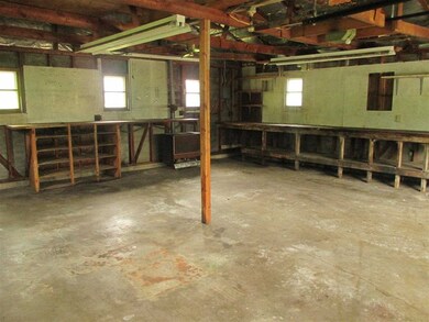 spacious 2 car garage with plenty of work space