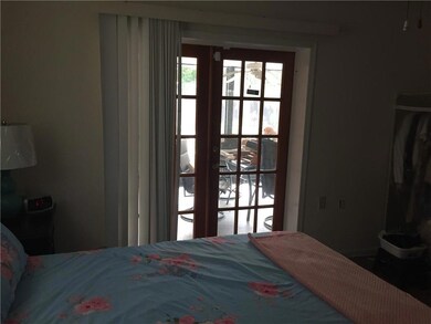 Master Bedroom French doors look out on Patio/Pool