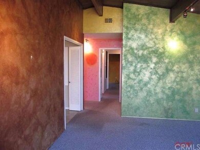Living Rm. looking down the hall. Sliding doors to
