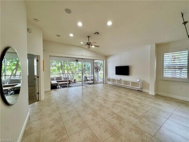 Unfurnished living room with ceiling fan, lofted c