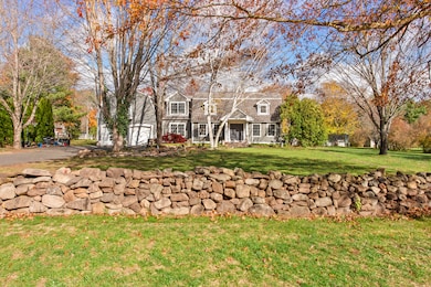 Charming Stone Wall across the front
