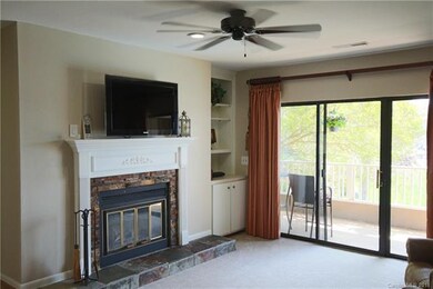 Living room with wood burning fireplace