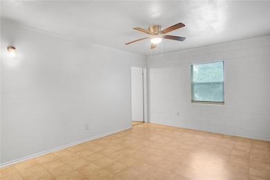 Spare room featuring ceiling fan