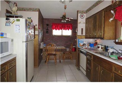 Tile flooring in the kitchen and neat breakfast no
