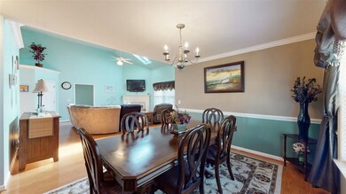 Formal Dining room is open to living room and adja