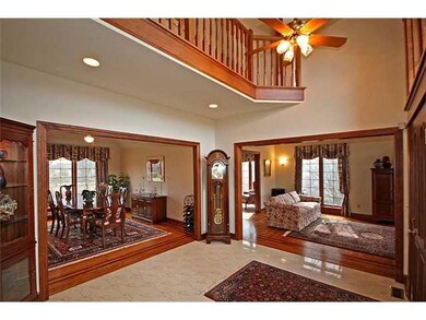 Foyer Soaring foyer with exquisite woodwork