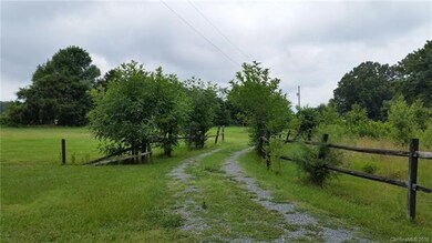 Driveway to right of lot connects with adjacent lo