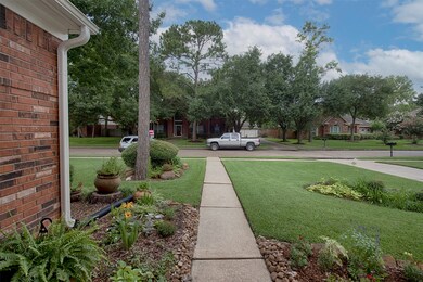 A view from the front porch of the gorgeous garden area to this wonderful quiet neighborhood.