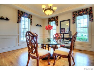 With heavy moldings and tray ceiling