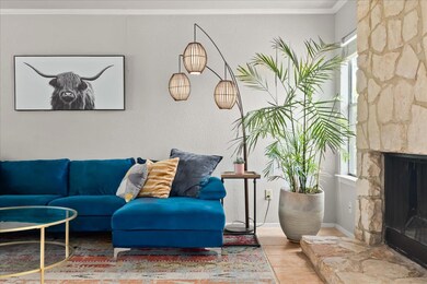 Living area featuring a fireplace, tile patterned
