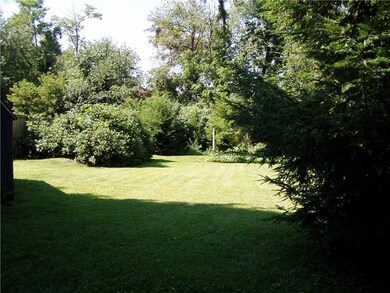 Exterior Back. Beautiful back large level yard .