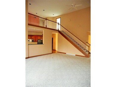 View of stairwell to second floor from great room.