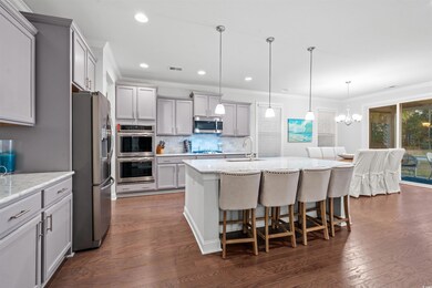 Kitchen featuring dark hardwood / wood-style floor