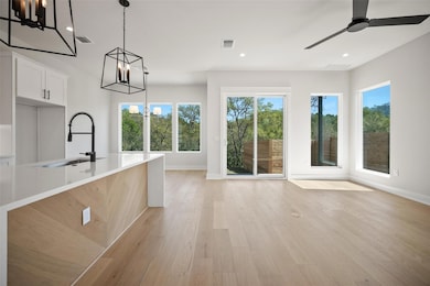 Kitchen featuring visible vents, light wood-style