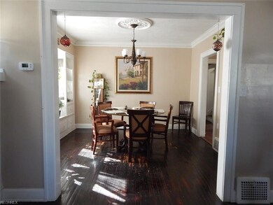 Hardwood floors continue into the dining room.