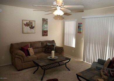 Family room w/ sliders out to patio.