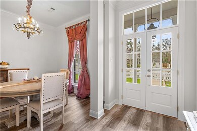 Foyer with a beautiful beveled glass front door